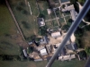 painswick-lodge-aerial-view-with-farm-buildings-at-foot-house-on-right